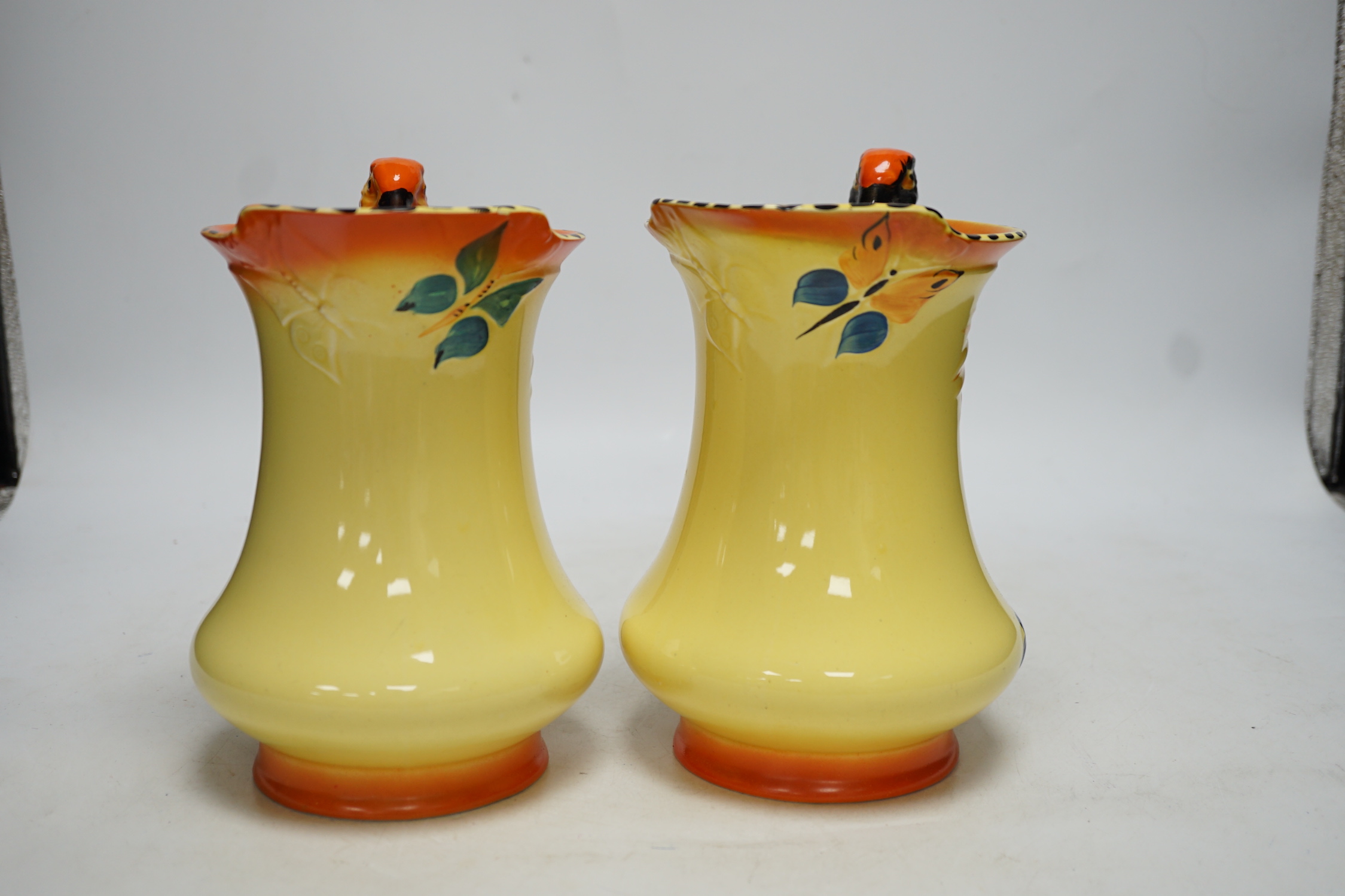 A pair of British Burleigh novelty ‘parakeet’ jugs, 20cm